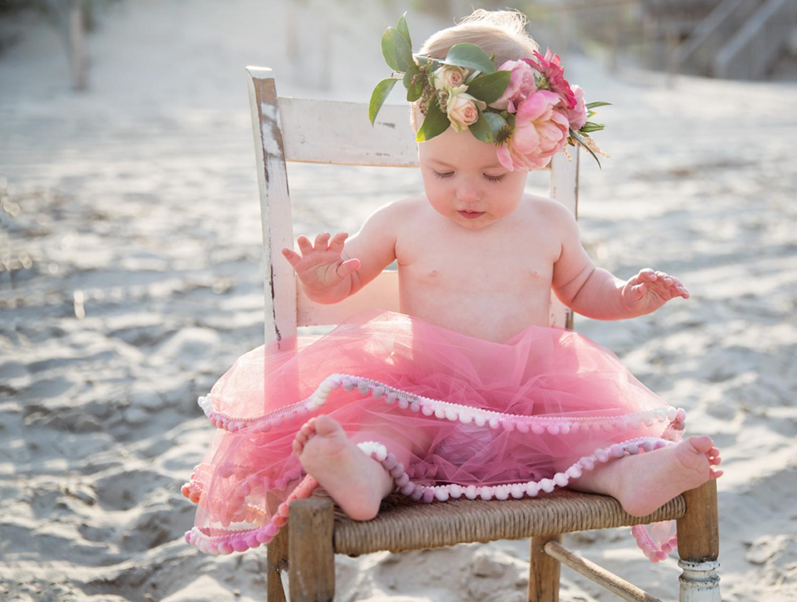 One year old birthday photos of girl in tutu and flower crown